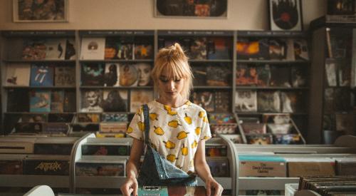 Woman at a record store