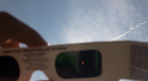 Solar glasses looking at solar eclipse