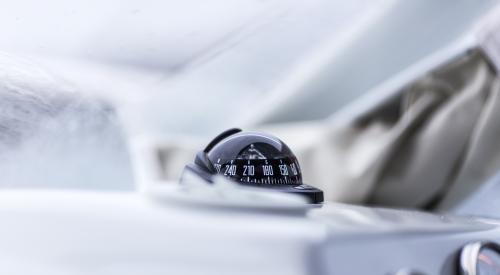 Compass on car dashboard