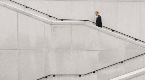 Man walking up stairs