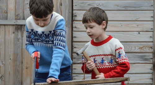 Future construction workers? Two boys building together