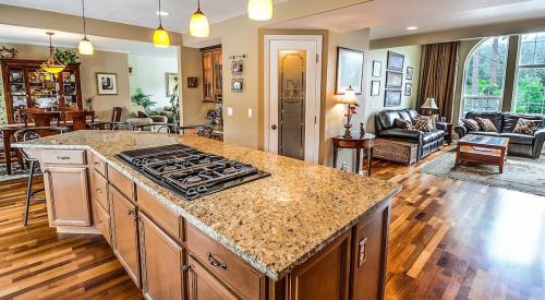 A kitchen with new appliances and furnishings