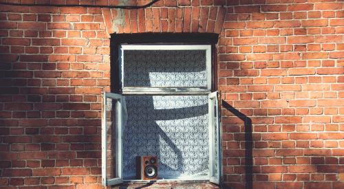 House exterior with open window