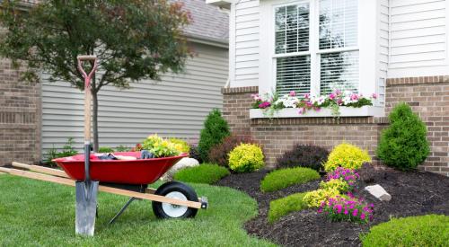 Landscaping equipment on home front lawn