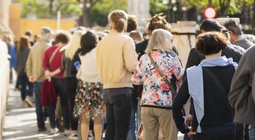 People in a long queue