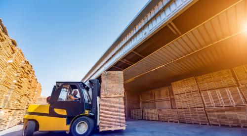 Lumber pallets being moved