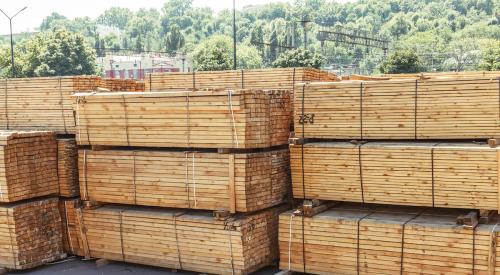 Stacks of lumber pallets in lumber yard