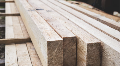 lumber stacked and ready for home building