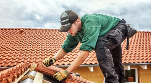 Man Working on Roof