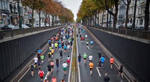 Runners on a city street