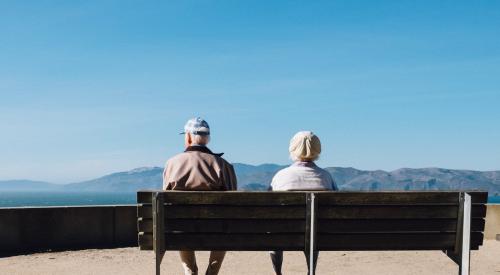 Couple sitting on bench, Land's End, San Francisco, Calif.