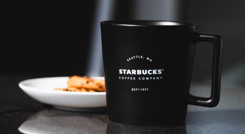 Starbucks coffee mug on a table