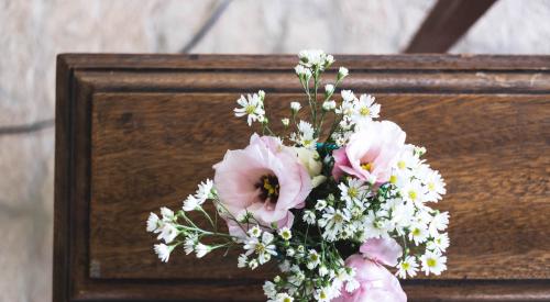 Bouquet of flowers on sideboard