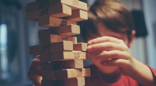 Child playing Jenga