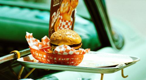 Car with tray of food on it