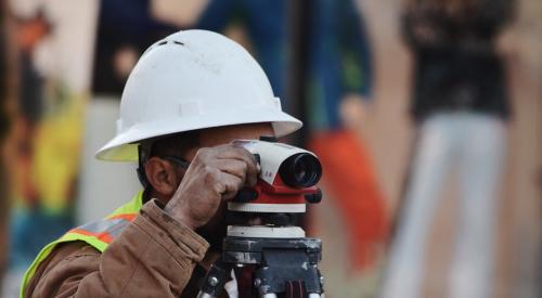 Man surveying land