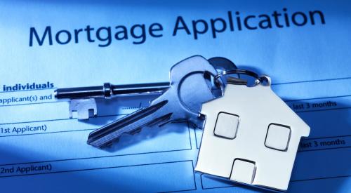 House keys on mortgage application form 