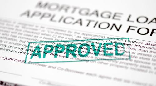 Approved stamp on mortgage loan application form