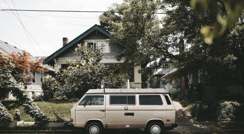 Van parked in front of house