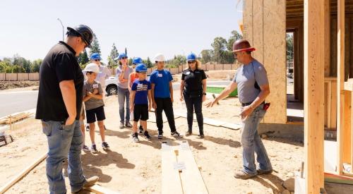 Students getting construction experience on a job site