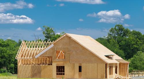 Newly framed single-family house under construction