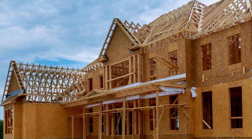 New single-family wood-framed house under construction