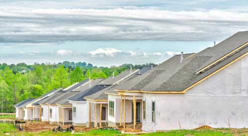 Row of new houses under construction