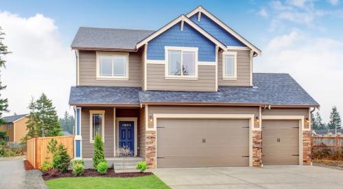 Newly completed blue and gray house