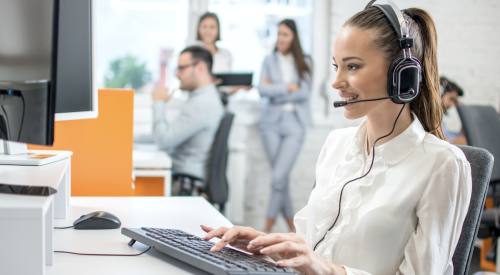 Woman making phone call to follow up on a home builder sales lead 