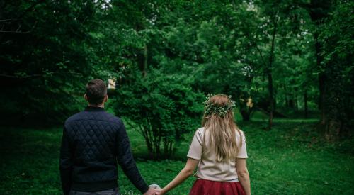 Couple holding hands