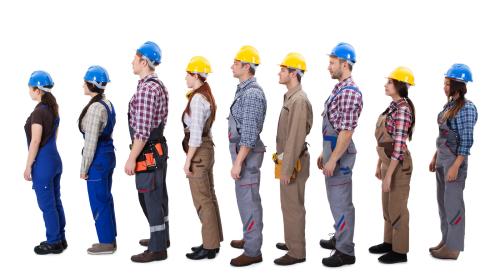 Construction workers in a line