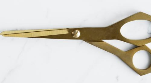 Gold pair of scissors