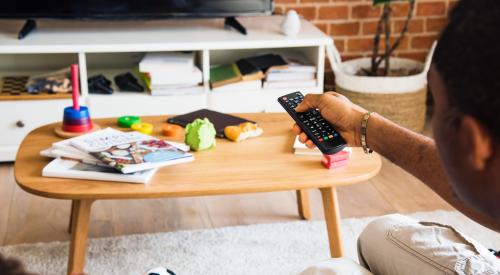 Person at home picking out something to watch