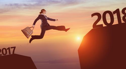 Woman leaping across a divide