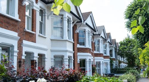 Row of red brick neighborhood houses