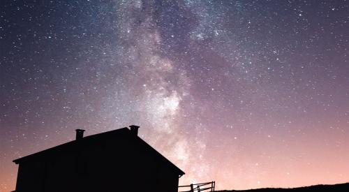 House exterior under starry night