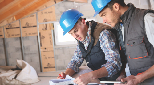 architect and engineer on jobsite check house plan