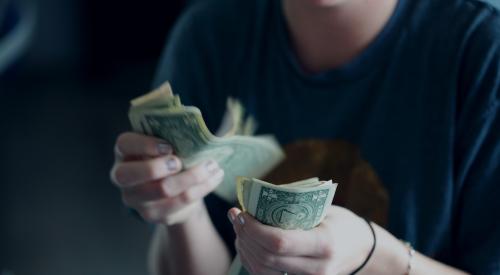 Woman counting money