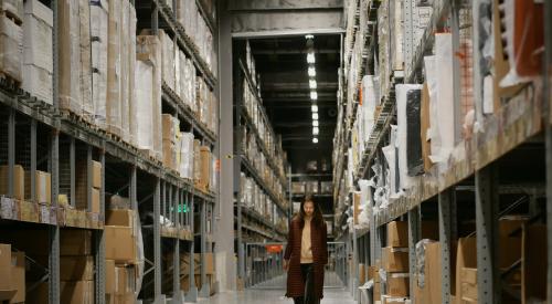 Person walking in aisle of Home Depot store