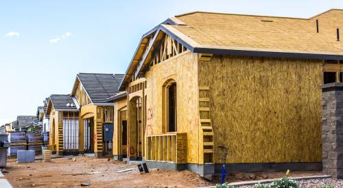 Row of newly constructed single-family homes in residential neighborhood