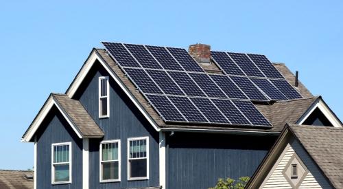 Solar panels on residential home rooftop power electrical systems in the home