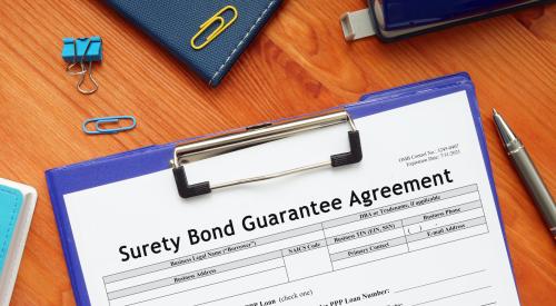 Surety bond application on clip board