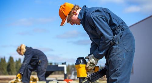 Construction trade students working outside