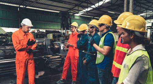 Construction teacher and students