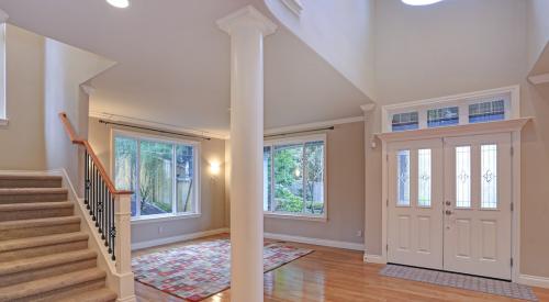 Modern home with high ceilings and two-story entryway