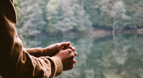 Person looking at a lake