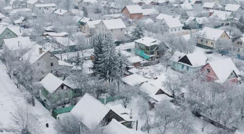 Aerial view of snowy winter houses