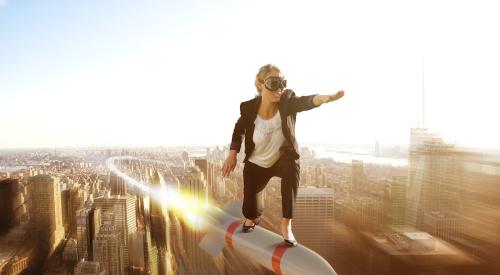 Woman riding a rocket