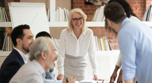 Female boss in leadership meeting