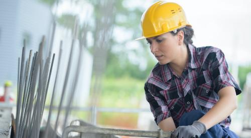 Woman working on a construction site